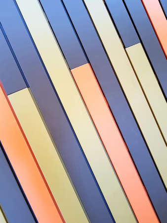 Multicolored stripes on the wall of the houseの写真素材