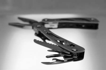 Multitool with open blades and accessories