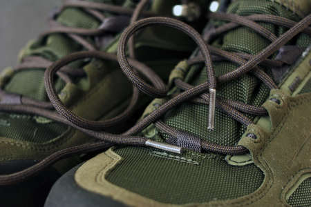 Gray laces on military bootsの写真素材