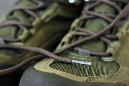 Gray laces on combat bootsの写真素材