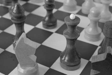 Chess queen on a chessboard