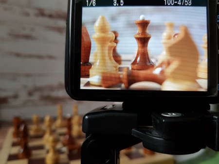 Chess queen on a chessboard