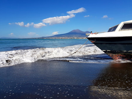Boat on the sandy seashoreの写真素材