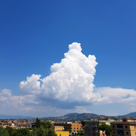 Clouds in the blue sky over the city of Bologna, Italyの写真素材
