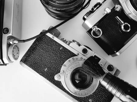 Vintage camera on a white background. Black and white photo.の写真素材