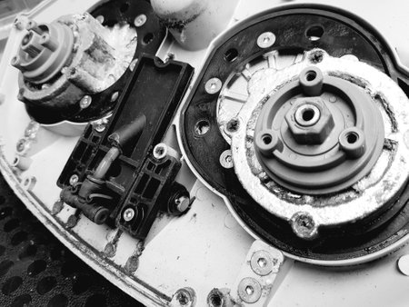 Close-up of parts of a car engine. Black and white photo.