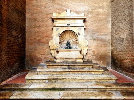 old marble fountain in the interior of the castle of Rimini, Italyの写真素材
