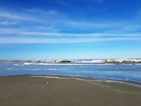 Beautiful beach with blue sky and white clouds. Nature composition.