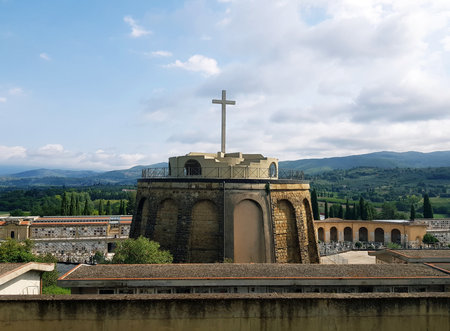 A Christian cross in a cemetery in Arezzo, Tuscany, Italyの写真素材