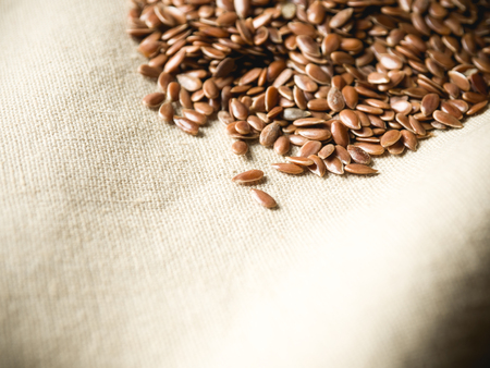 flax seeds on linen clothの写真素材