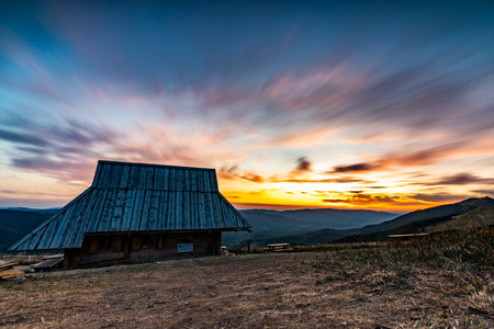 sunset in the WetliÅska pasture in the Bieszczady Mountainsの写真素材