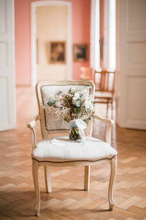 Winter wedding bouquet with white flowers in vintage styleの写真素材