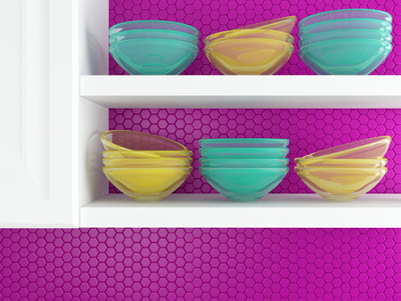 Fragment of interior of modern kitchen. Kitchenware on the white shelves.の写真素材