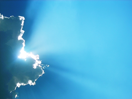 Blue sky with clouds and sun. Natural landscapeの写真素材