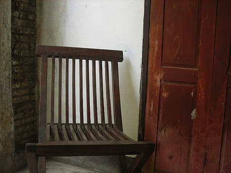 Wooden old chair. Textured backgroundの写真素材