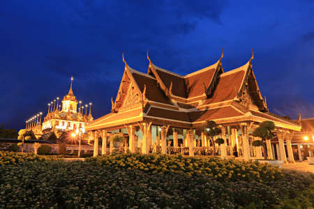 Wat Ratchanaddaram and Loha Prasat Metal Castle at twilight, Bangkok, Thailandのeditorial素材