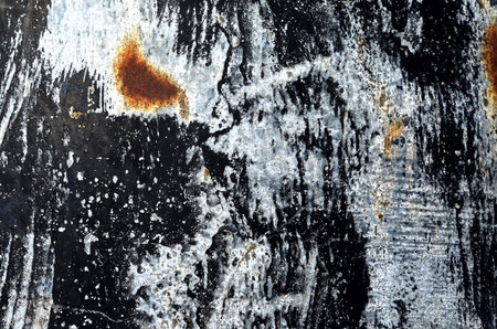 Metal texture with scratches and cracks which can be used as a background