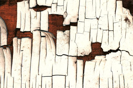 Old cracked paint on the wall. Abstract background and texture for design.