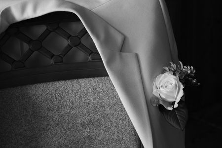 Bridegroom's jacket on a chair, black and whiteの写真素材