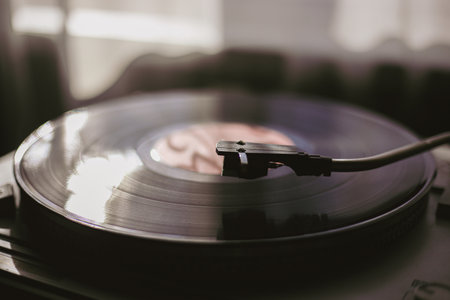 Playing classic vinyl records in daylight close-upの写真素材