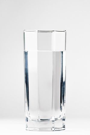 With a glass of water on a white backgroundの写真素材