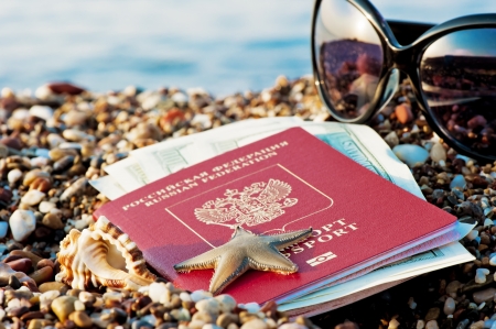 Still traveling with a Russian passport in the sand on the beachの写真素材