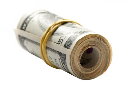 Banknotes of U.S. dollars off a rollの写真素材