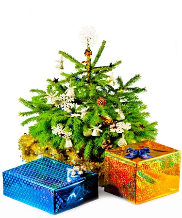 Christmas tree with gifts on a white backgroundの写真素材