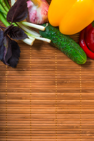 wholesome vegetables and straw napkin macroの写真素材