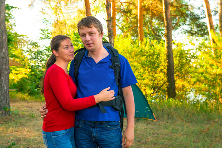 young couple resting family campingの写真素材