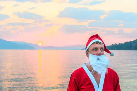 Portrait of Santa Claus on a background of the seaの写真素材