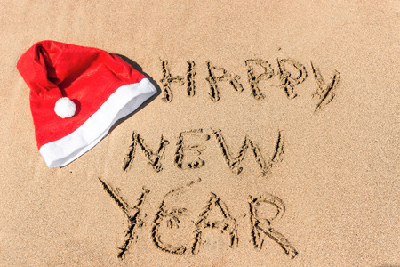 written in the sand, happy new year