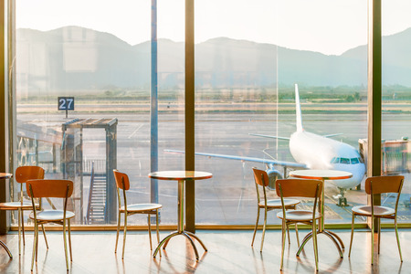 empty cafe tables in the airport and on the plane viewのeditorial素材