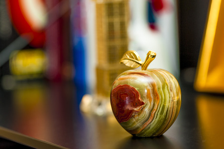 beautiful figurine in the form of an apple made of onyxの写真素材