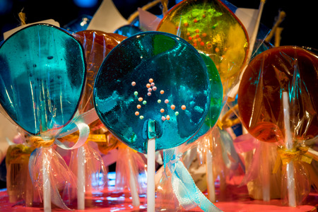 lollipops different colors in the pack close upの写真素材