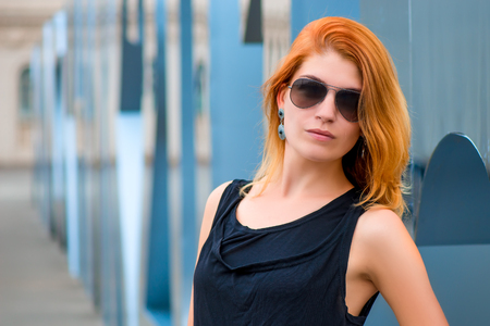 Portrait of a fashionable young girl in the cityの写真素材