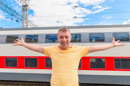 happy man enjoys double-decker train as a child