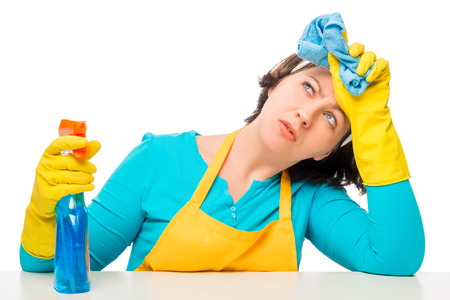 portrait of tired of household chores housewife on a white backgroundの写真素材