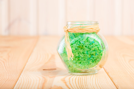 glass jar with sea salt with natural pine extractの写真素材