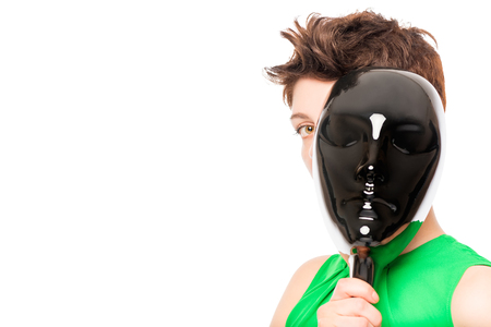 stranger out from behind the glossy black mask on a white backgroundの写真素材