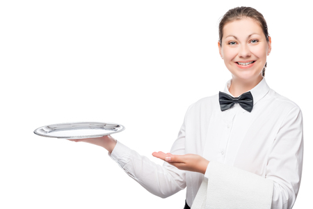 waitress woman pointing to his empty tray, a portrait in the studioの写真素材