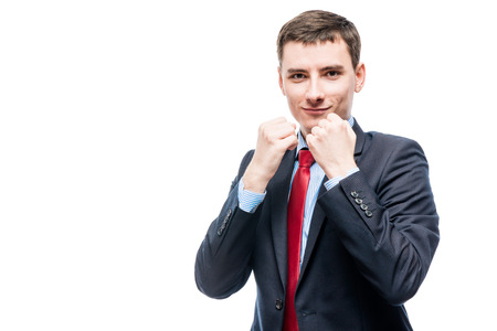 Conceptual photograph of a successful businessman ready for battle isolated