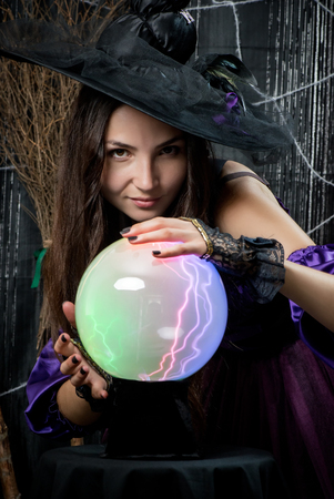 portrait of a witch with a magic ball for predictionsの写真素材