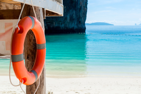 close-up of a life buoy against the background of the bay of the seaの写真素材