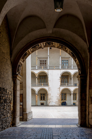 Krakow, Poland - August 13, 2017: beautiful architectural arch and a view of the columns of the royal palace in the castle of Wawelのeditorial素材