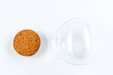 Clear glass bottle with cap isolated on white background, zero waste conceptの写真素材