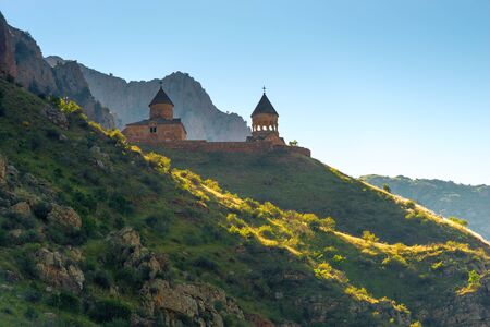 Orthodox monastery Noravank on a rock in the morning sun, a landmark of Armeniaの写真素材