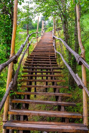 Wooden staircase in summer park close up, no peopleの写真素材
