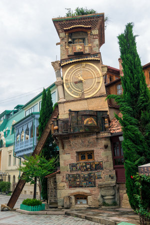 Beautiful Clock Tower of puppet theater Rezo Gabriadze in historical center of old Tbilisi, Georgiaのeditorial素材