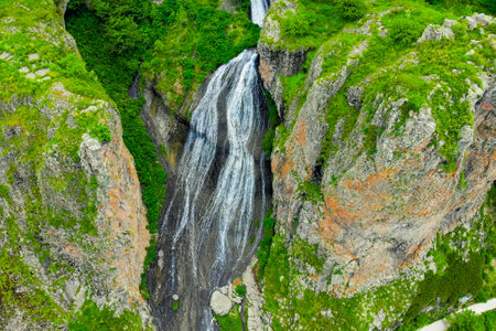 Top view flowing water of the large Mermaid Hair Waterfall in the city of Jermuk, a landmark of Armeniaの写真素材